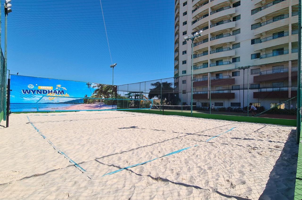 Wyndham Olimpia Royal Hotels Exterior photo The Wynham Beach Volleyball Courts