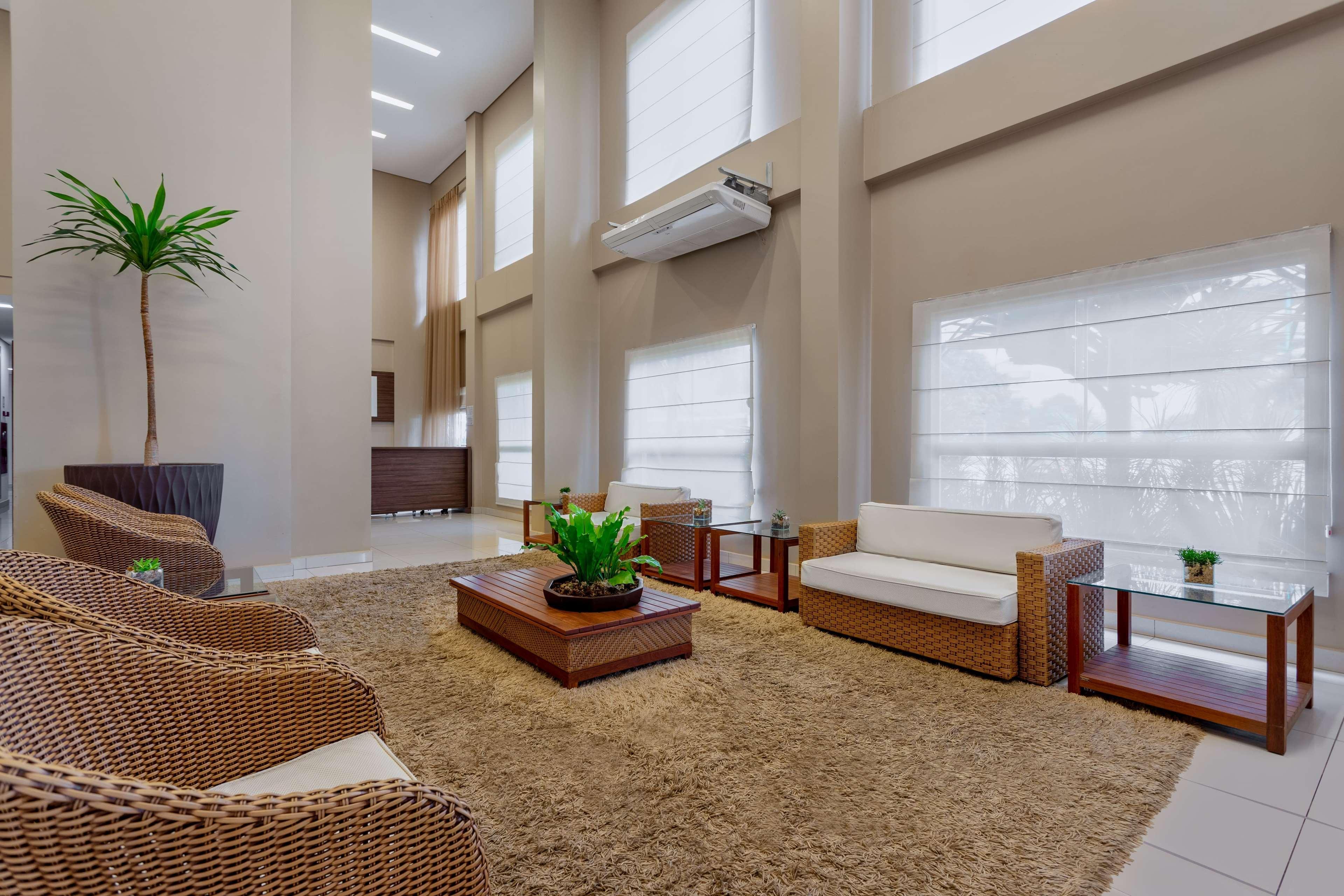 Wyndham Olimpia Royal Hotels Exterior photo A living room with a carpet
